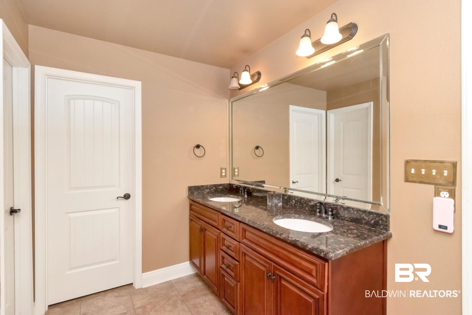 27890 Rileywood Drive Daphne, AL 36526 - Photo 22 of 49 Full bath with tile patterned flooring, baseboards, a sink, and double vanity