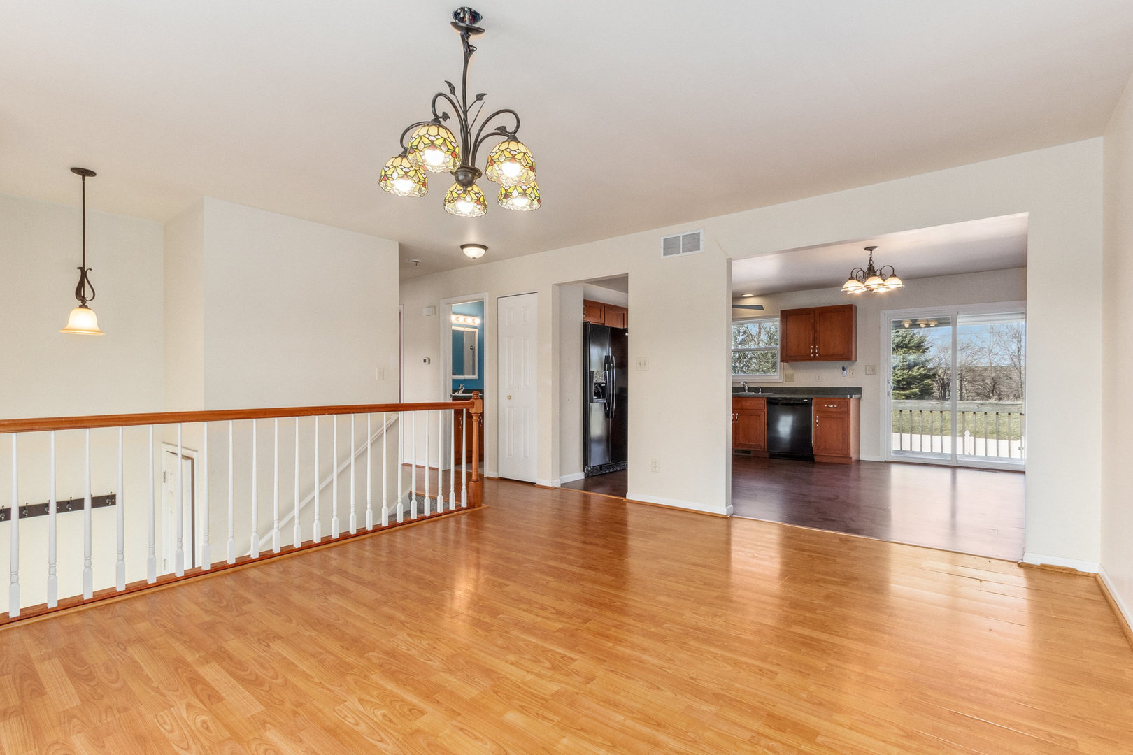 415 Davidson Drive Minooka, IL 60447 - Photo 2 of 18 a view of a room with wooden floor