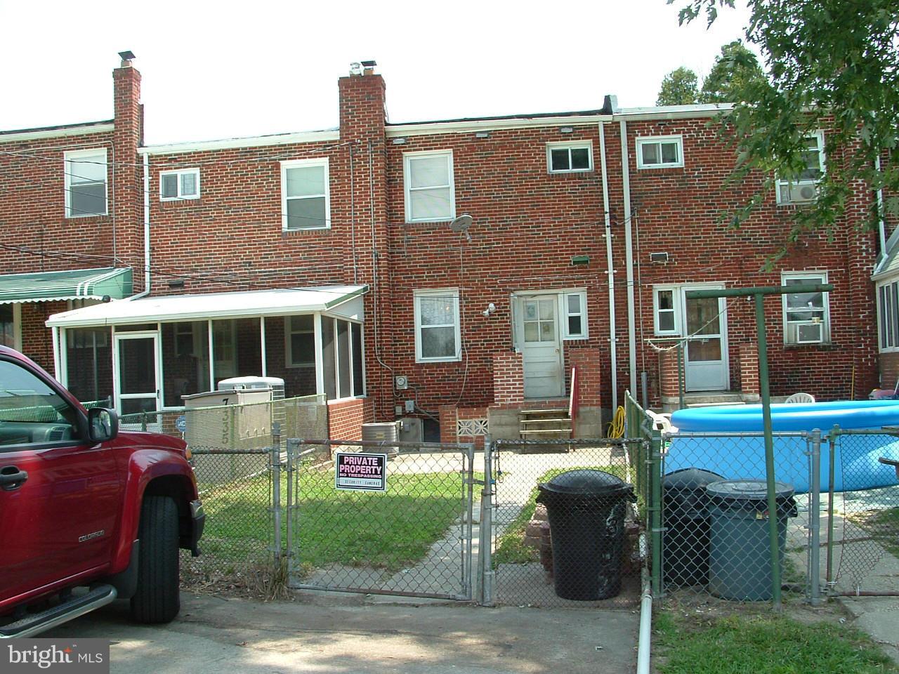 7337 Berkshire Road Baltimore, MD 21224 - Photo 14 of 18 Fenced yard with parking pad for 2 and patio