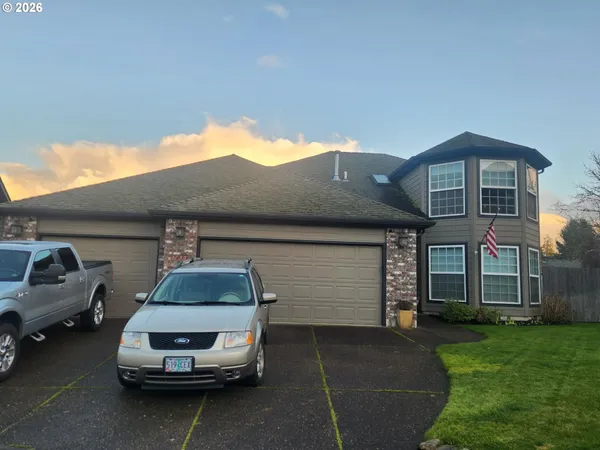 a car parked in front of a house