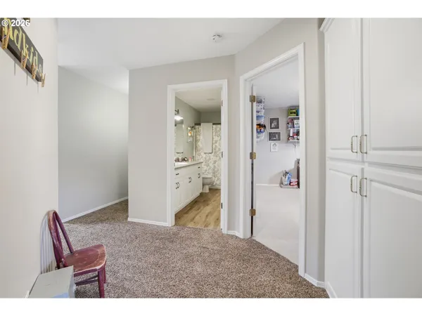 a view of room with wooden floor