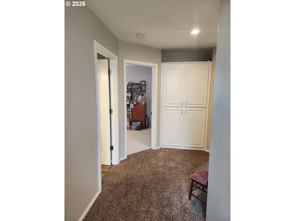 a view of a hallway with closet