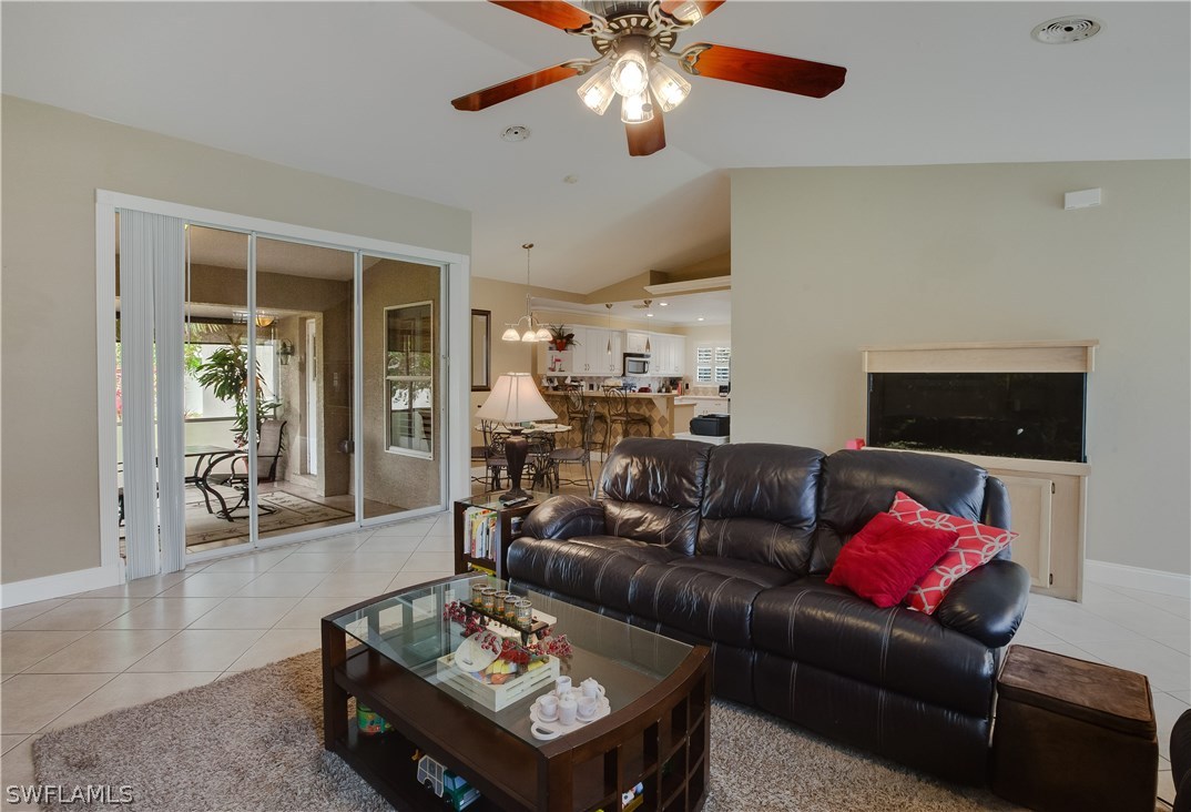 17373 Butler Road Fort Myers, FL 33967 - Photo 5 of 20 a living room with furniture and a flat screen tv