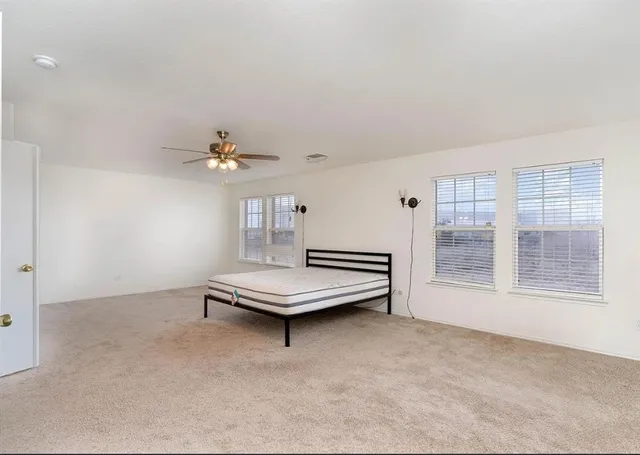 a view of livingroom with furniture and window