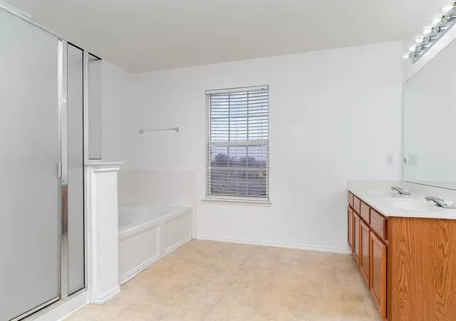 a view of an empty room with a sink