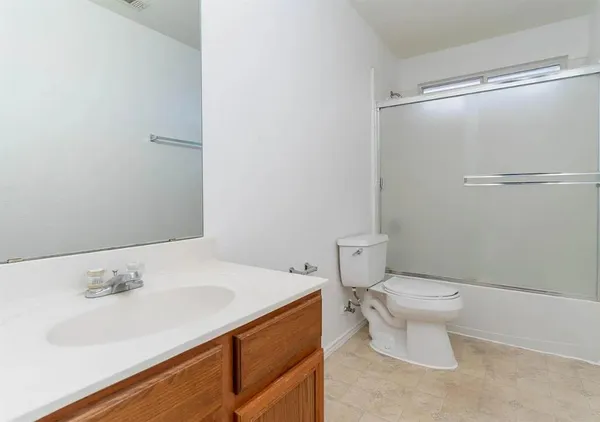 a bathroom with a sink and a toilet