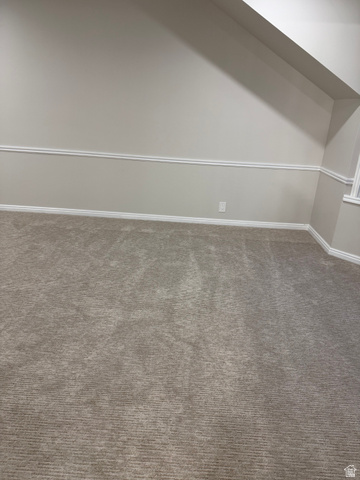 8965 Quail Run Drive Sandy, UT 84093 - Photo 34 of 56 Bonus room with dark carpet and baseboards