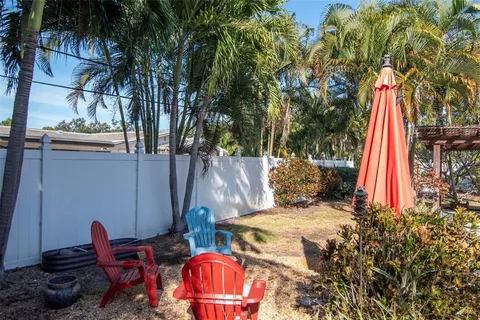 a front view of a house with a yard and porch
