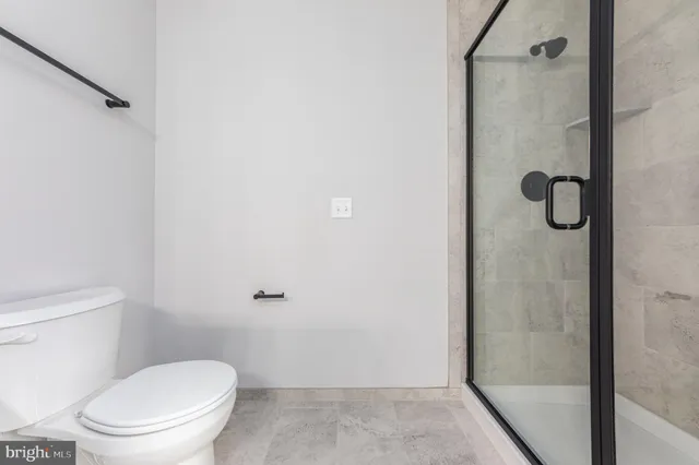 a white bath tub sitting in a bathroom