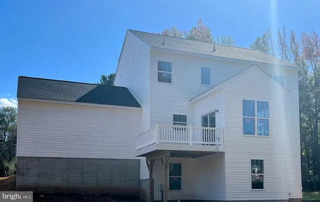 a front view of a house with a garage