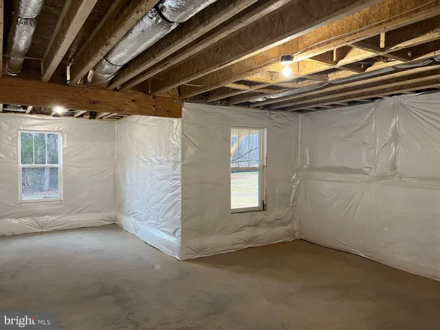 a view of a room with windows