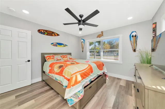 a view of an outdoor dining space with a table and chairs