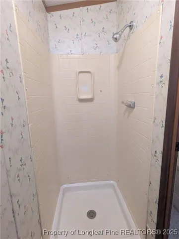 a bathroom with a bath tub