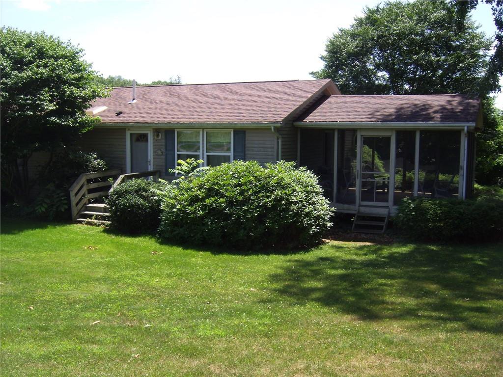 130 West Liberty Road Slippery Rock, PA 16057 - Photo 2 of 14 a front view of a house with garden and porch