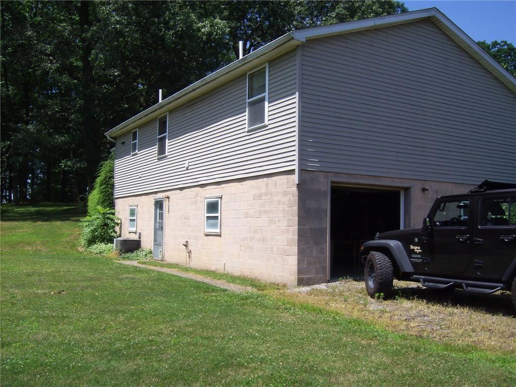 130 West Liberty Road Slippery Rock, PA 16057 - Photo 5 of 14 a backyard of a house with barbeque oven