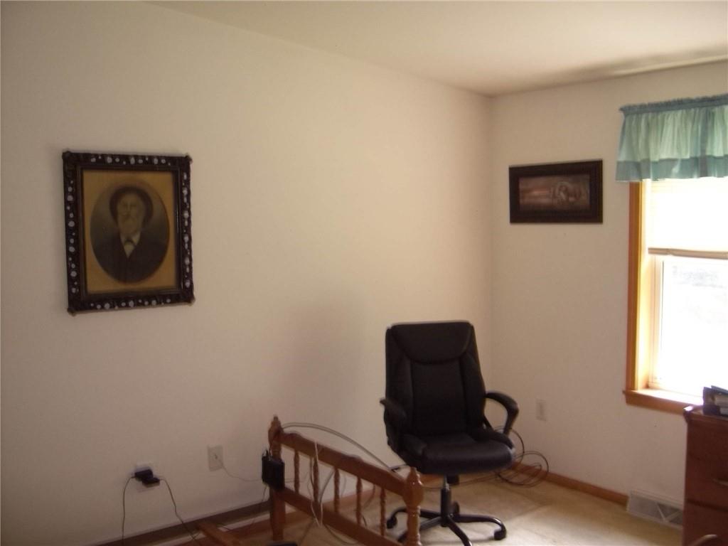 130 West Liberty Road Slippery Rock, PA 16057 - Photo 10 of 14 a chair and a table in a room