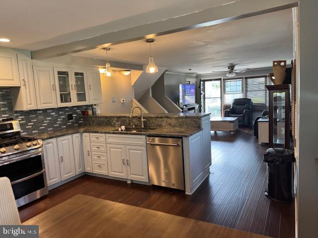 1355 Forrest Street Trainer, PA 19061 - Photo 15 of 37 a kitchen with stainless steel appliances granite countertop a stove and cabinets