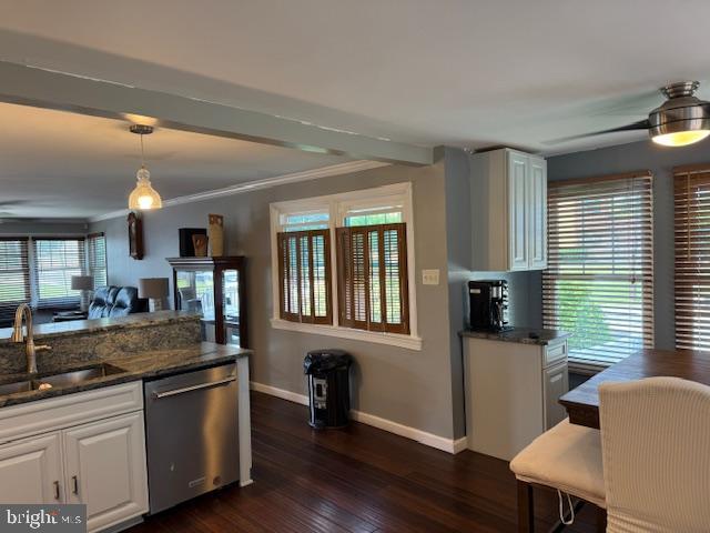 1355 Forrest Street Trainer, PA 19061 - Photo 19 of 37 a kitchen with stainless steel appliances granite countertop a sink stove and wooden floor
