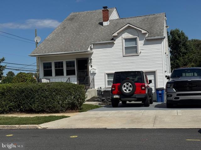 1355 Forrest Street Trainer, PA 19061 - Photo 2 of 37 a view of a car parked in front of a house