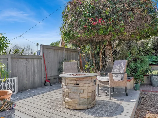 a view of a chairs and table on the wooden floor