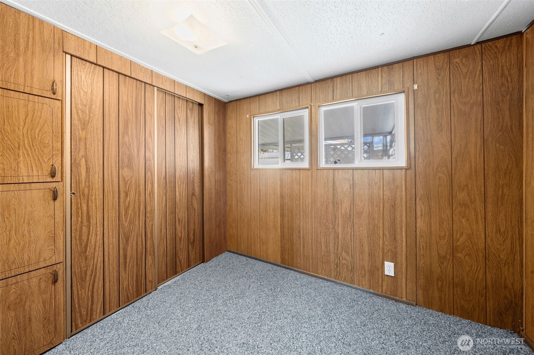 930 Trosper Road Southwest, Unit 33 Tumwater, WA 98512 - Photo 13 of 26 a view of an empty room with a window