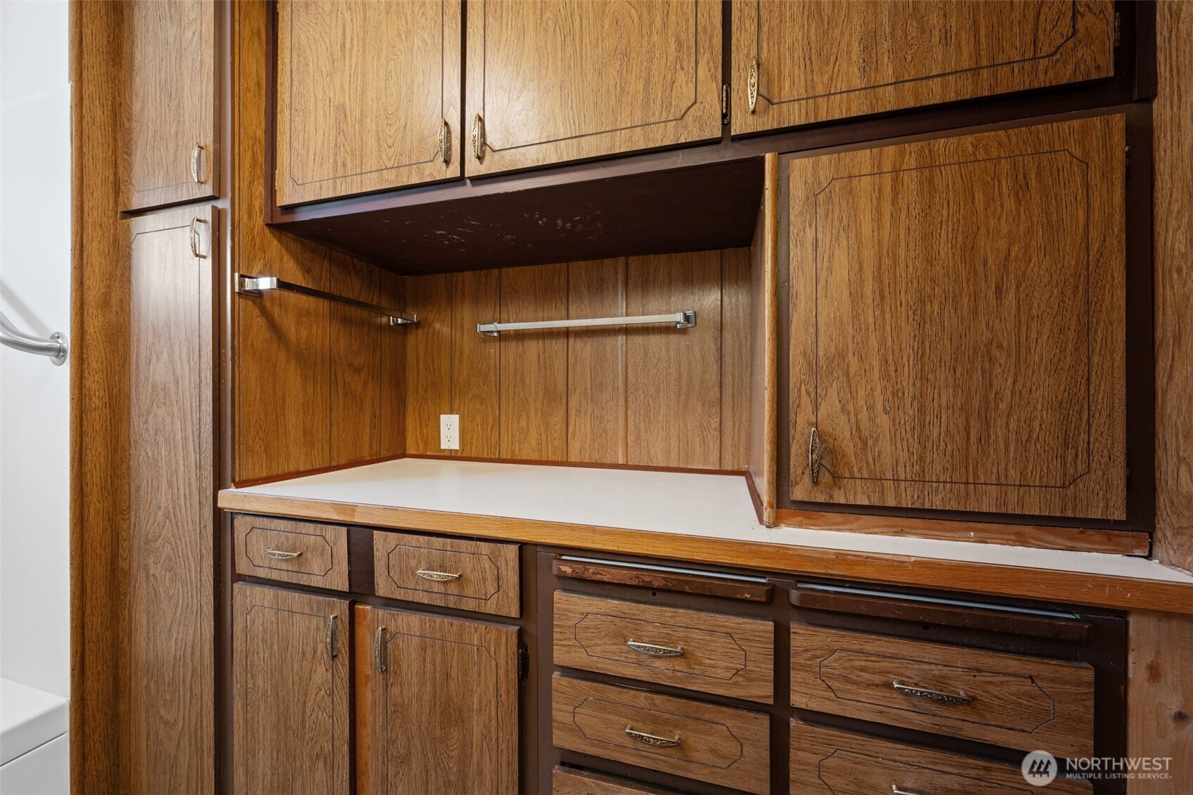 930 Trosper Road Southwest, Unit 33 Tumwater, WA 98512 - Photo 16 of 26 a kitchen with kitchen island a sink cabinets and appliances