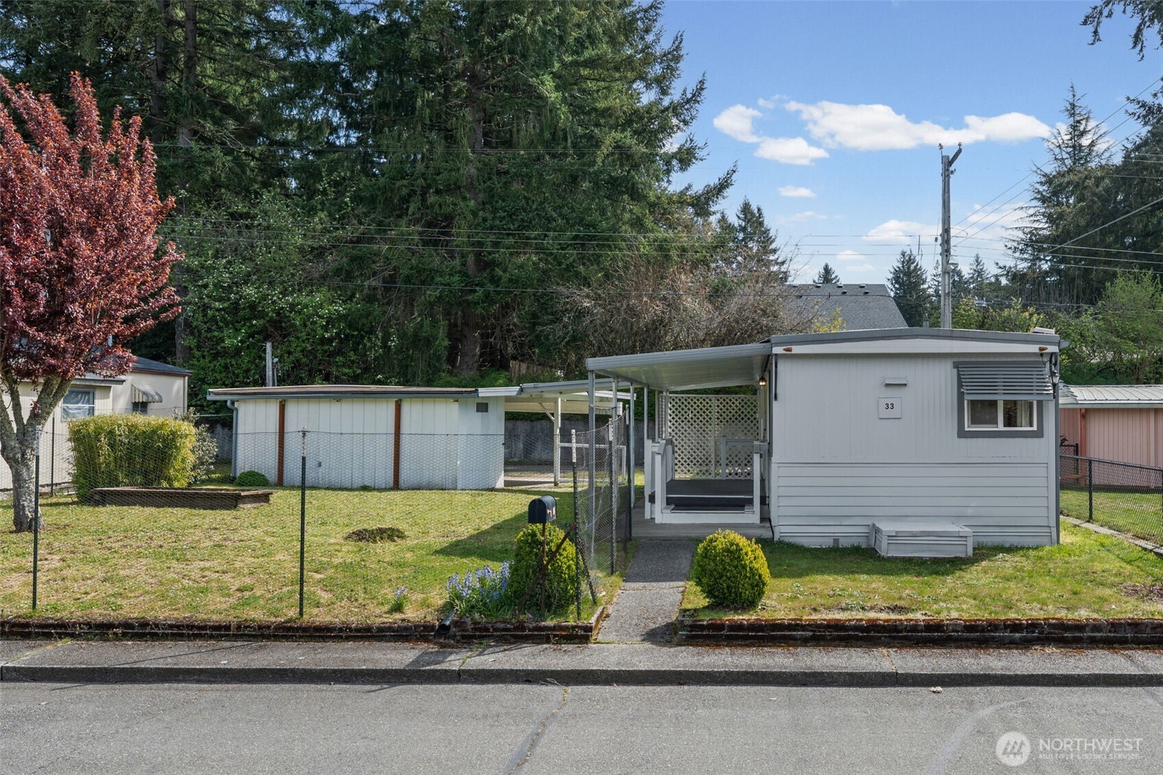 930 Trosper Road Southwest, Unit 33 Tumwater, WA 98512 - Photo 2 of 26 a view of a backyard