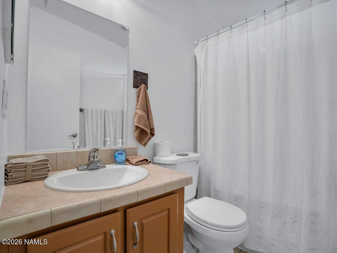 2705 West Honeysuckle Road Williams, AZ 86046 - Photo 17 of 40 Guest Bathroom