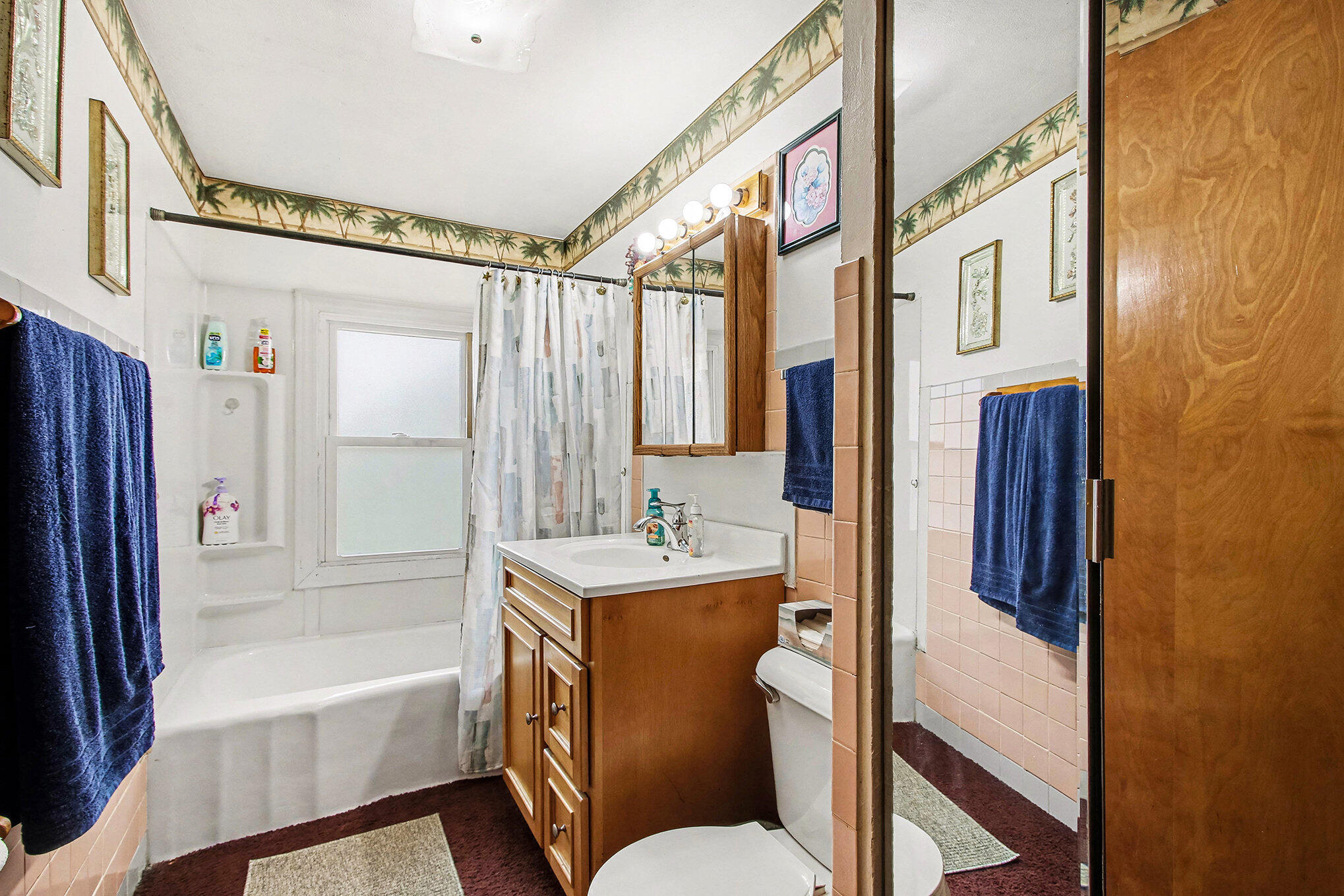 2954 Airport Road Portage, IN 46368 - Photo 4 of 14 a bathroom with a bathtub sink and mirror