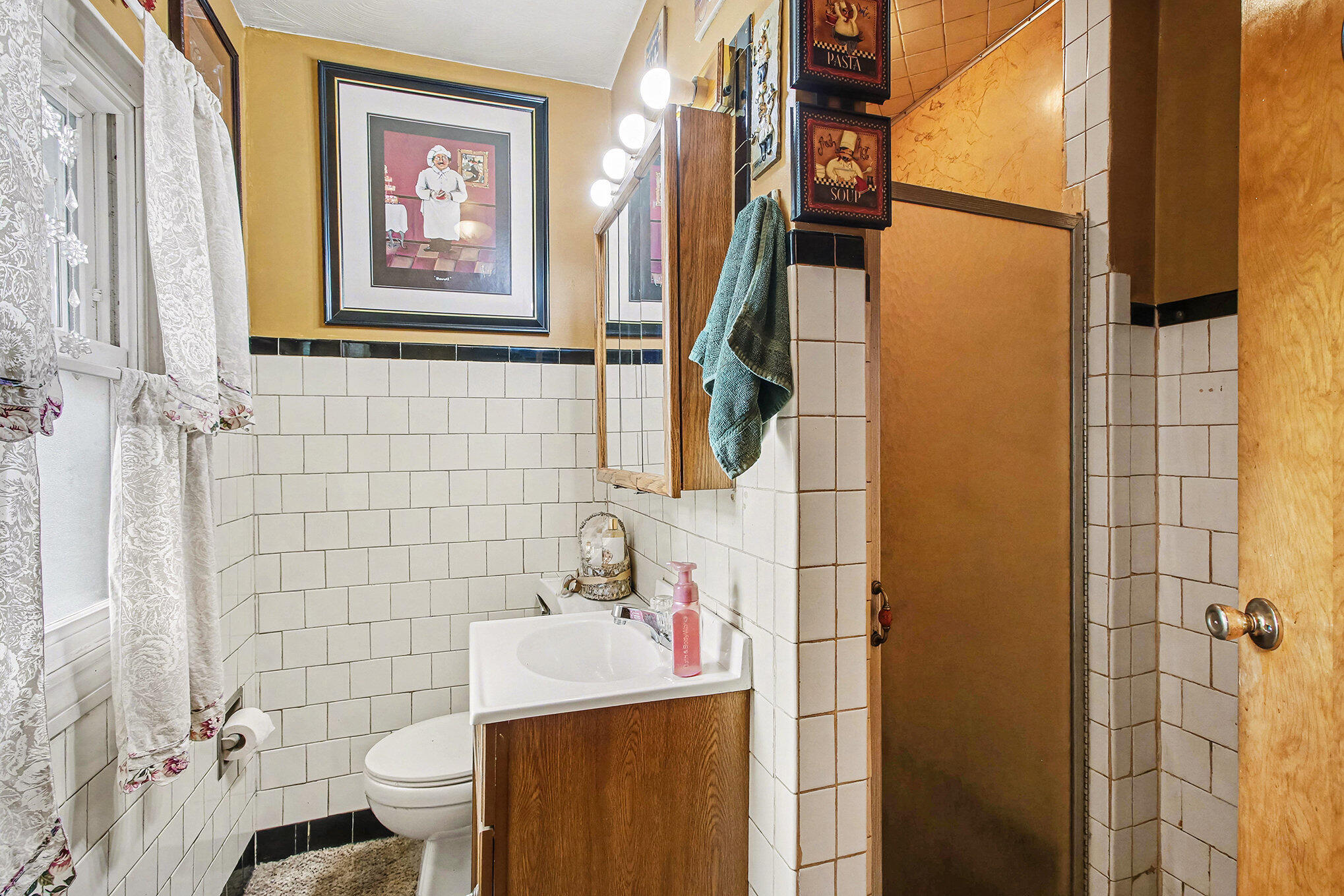 2954 Airport Road Portage, IN 46368 - Photo 5 of 14 a bathroom with a sink toilet and shower