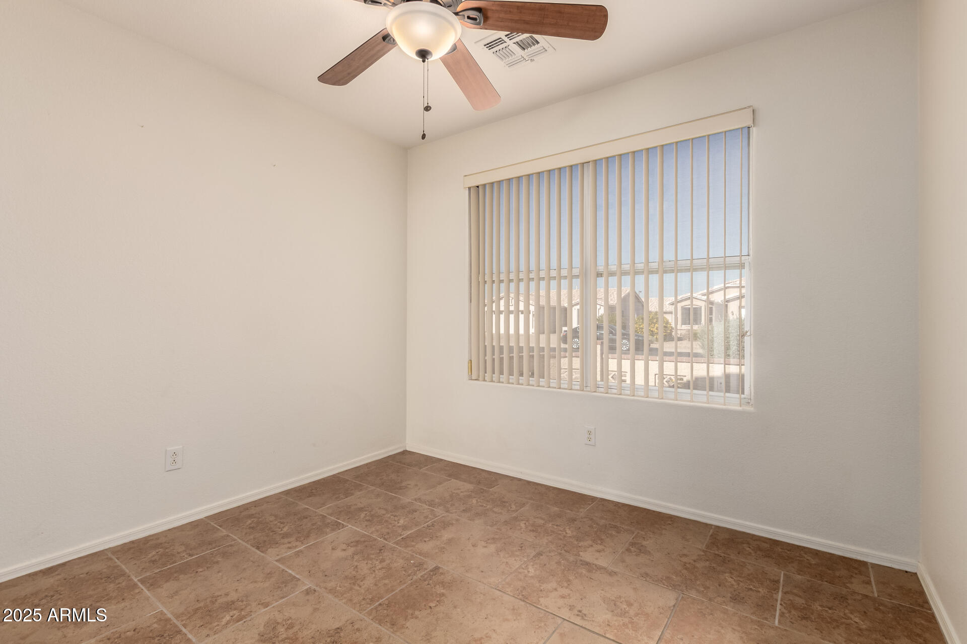 1475 East Riviera Drive Chandler, AZ 85249 - Photo 13 of 22 an empty room with a window