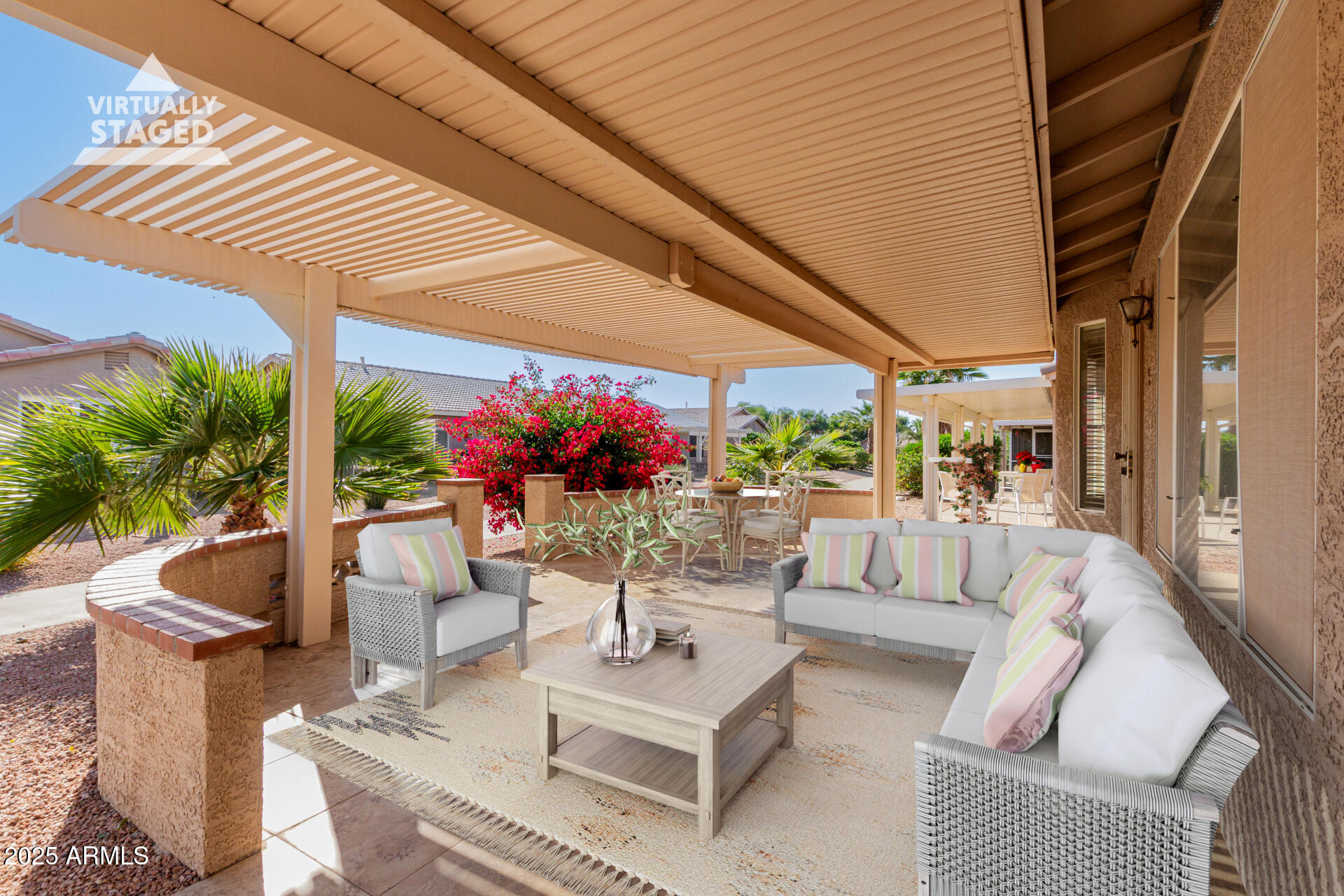 1475 East Riviera Drive Chandler, AZ 85249 - Photo 18 of 22 a view of a patio with couches and potted plants
