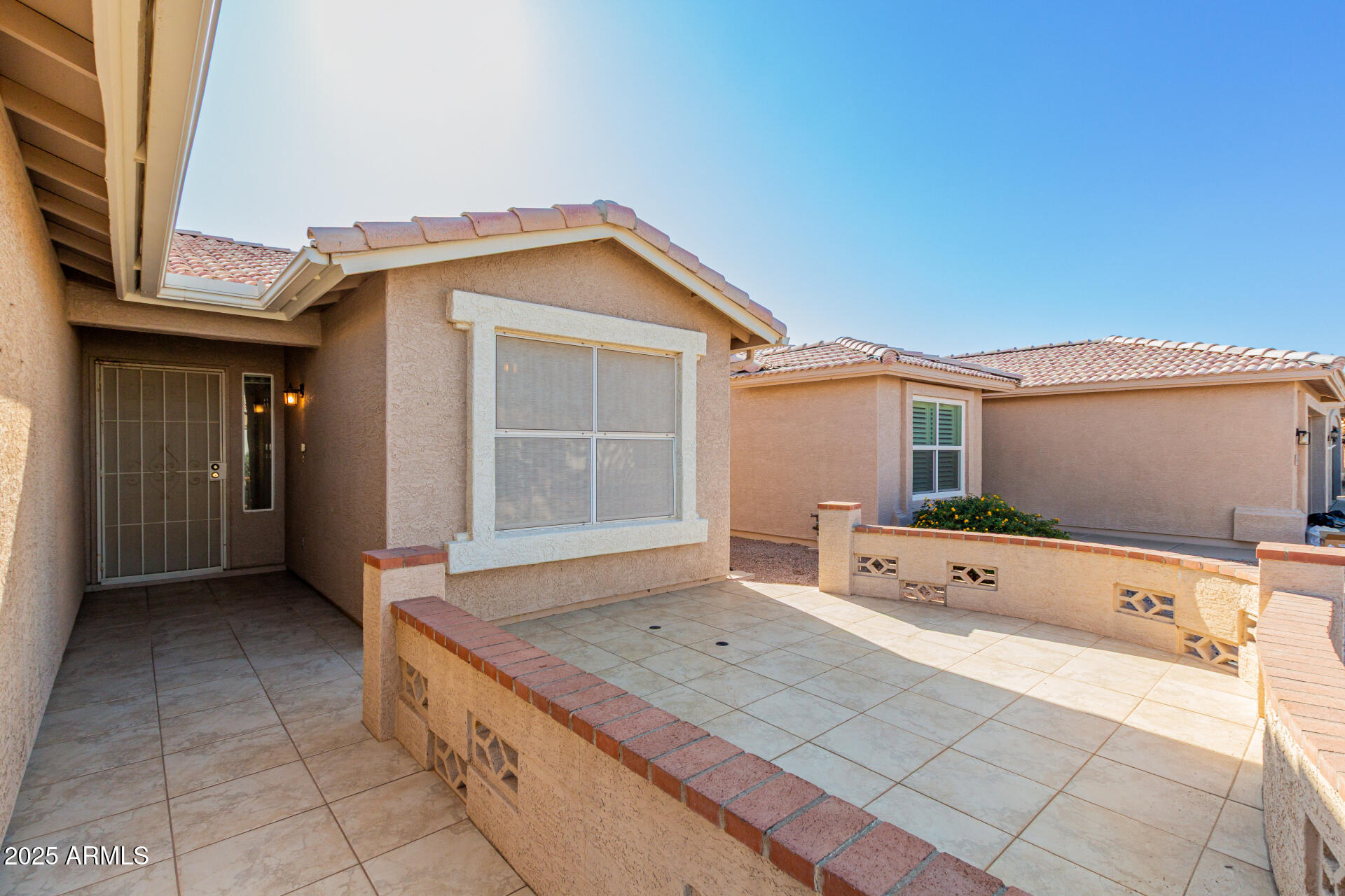1475 East Riviera Drive Chandler, AZ 85249 - Photo 19 of 22 a view of house and front door