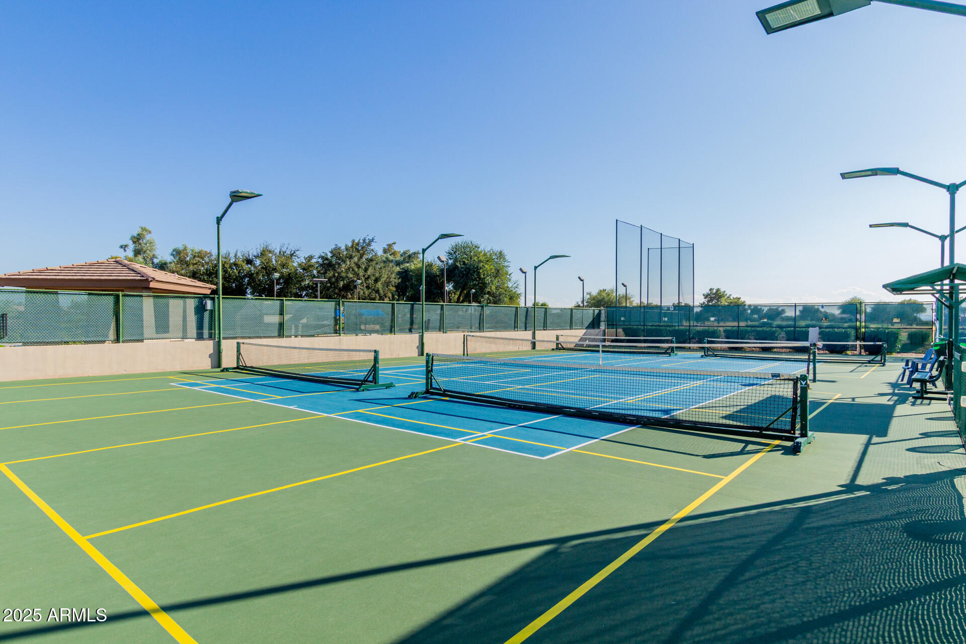 1475 East Riviera Drive Chandler, AZ 85249 - Photo 22 of 22 a view of an outdoor space and tennis court