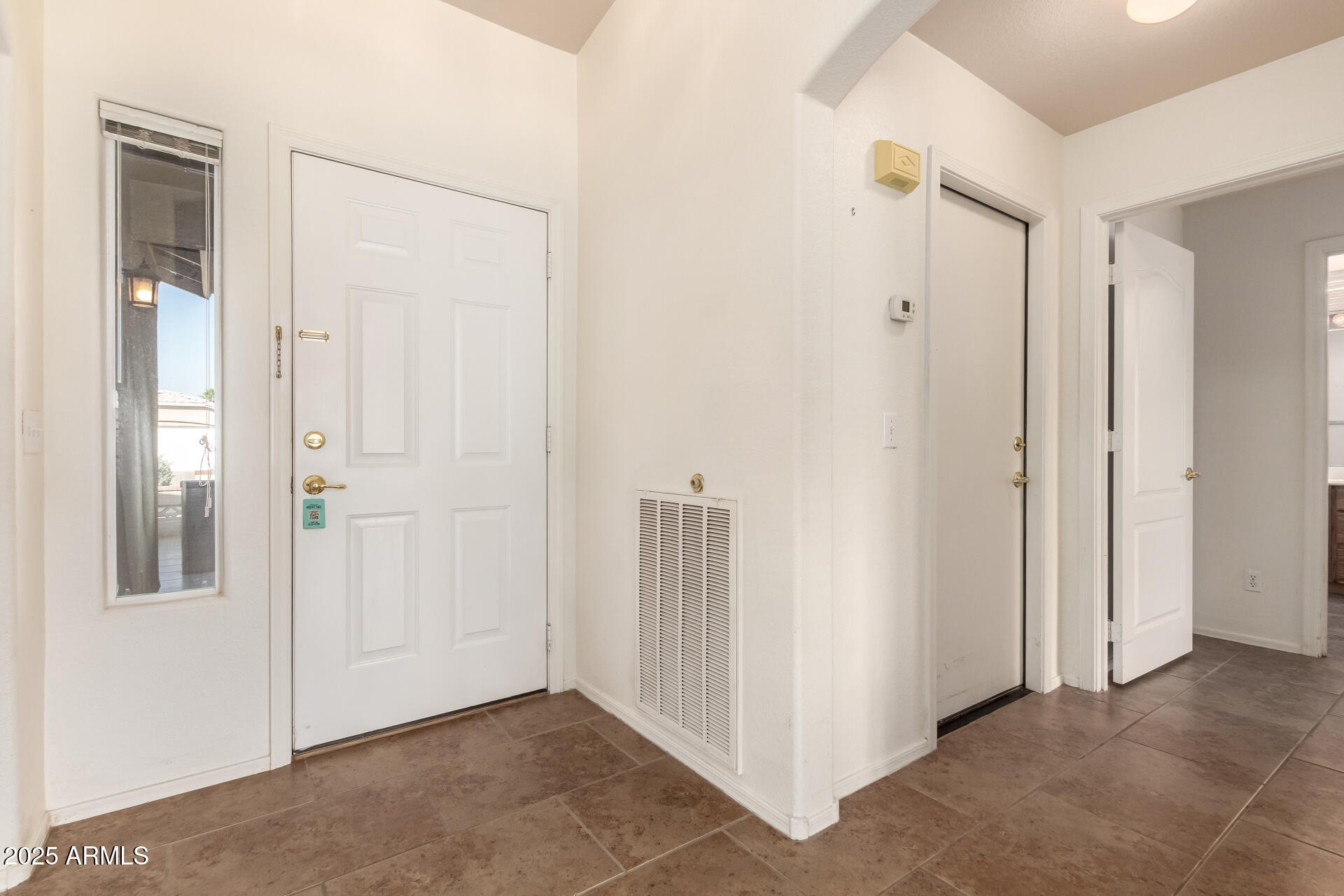 1475 East Riviera Drive Chandler, AZ 85249 - Photo 3 of 22 an empty room with closet area