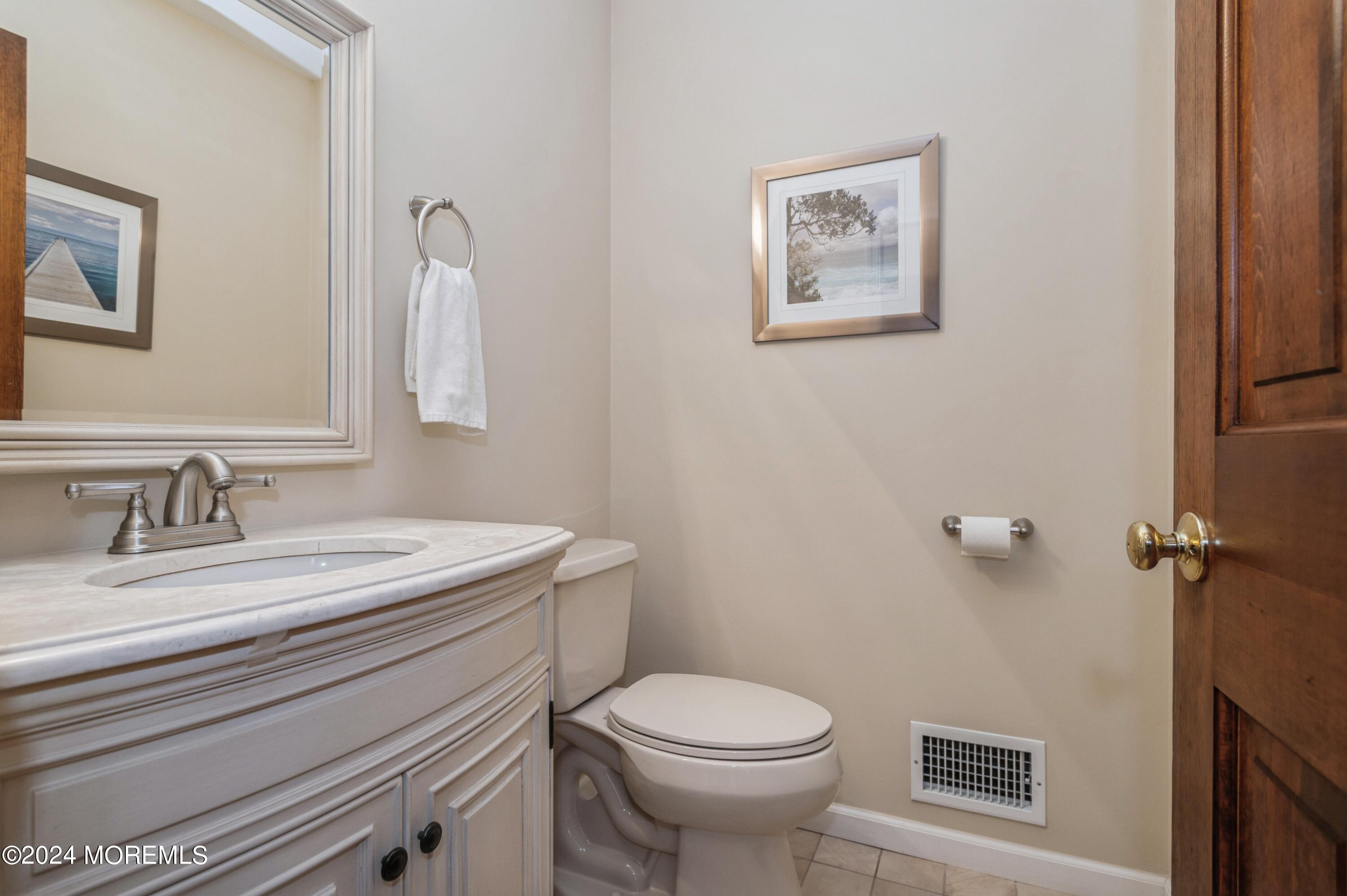 1208 Rue Avenue Point Pleasant, NJ 08742 - Photo 17 of 30 14_1208RueAve_7_HalfBathroom1stlevel_HiR