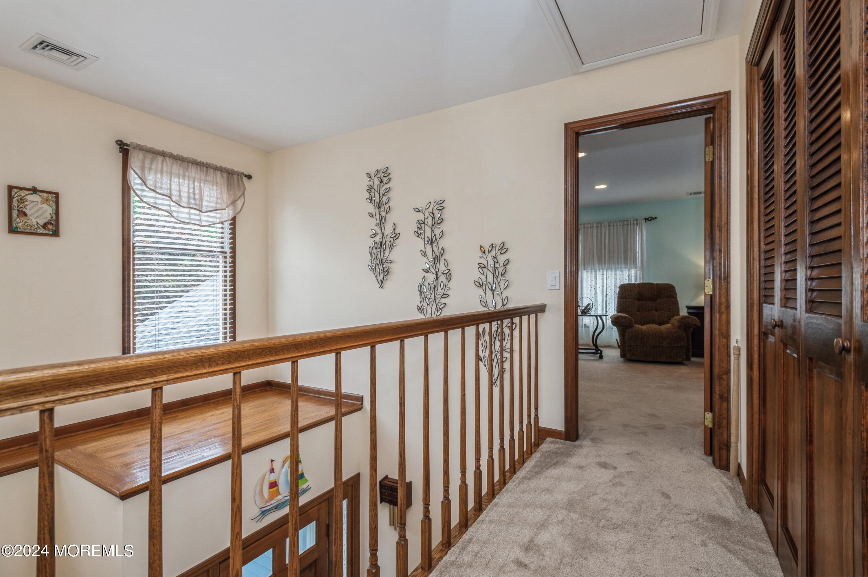 1208 Rue Avenue Point Pleasant, NJ 08742 - Photo 20 of 30 19_1208RueAve_6_HallwayBalcony2ndlevel_H