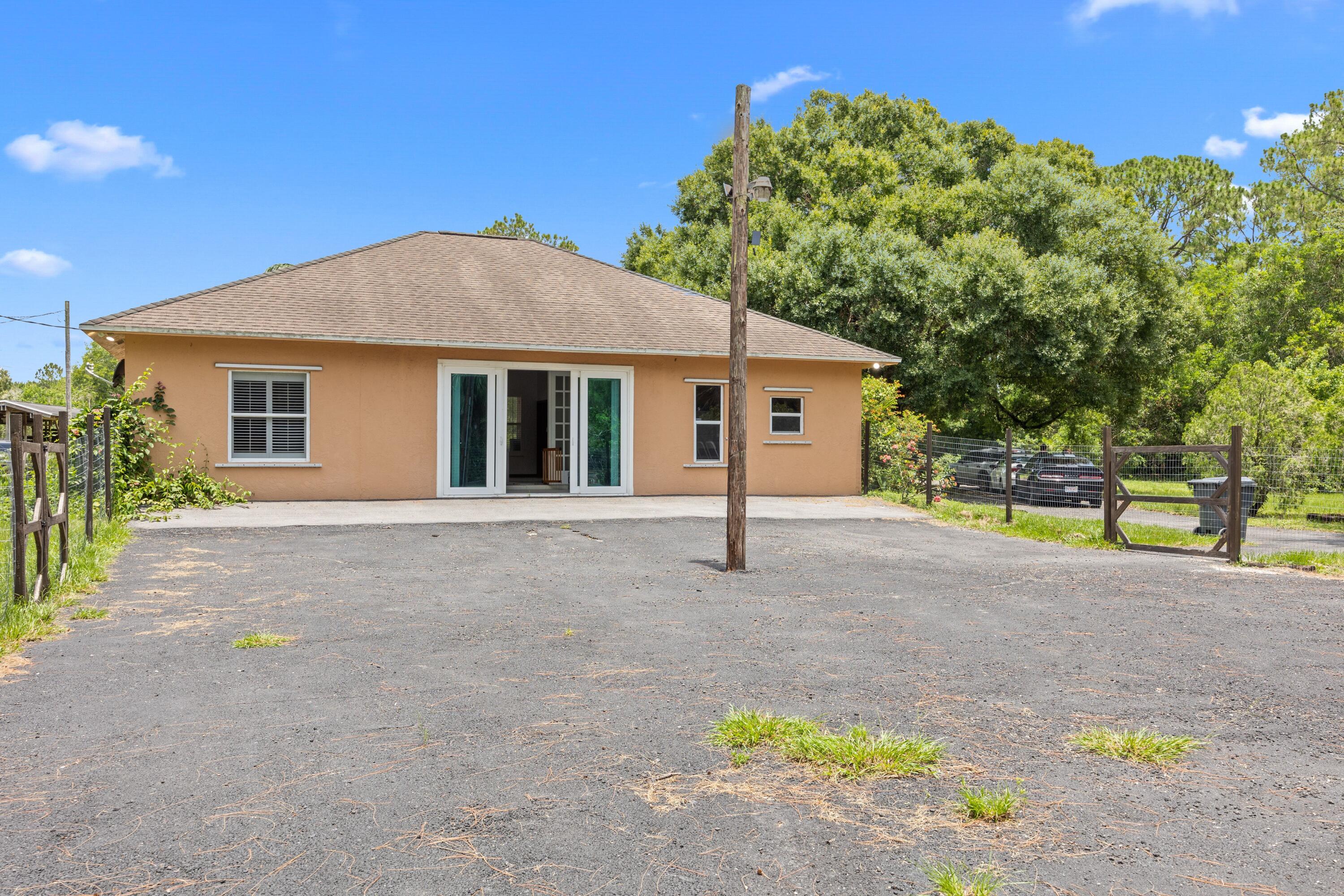 4860 Windmill Road Loxahatchee, FL 33470 - Photo 3 of 16 N8mP9c4I
