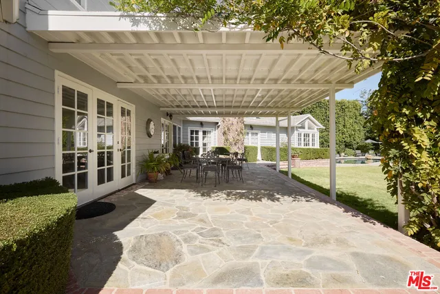 a view of swimming pool with patio