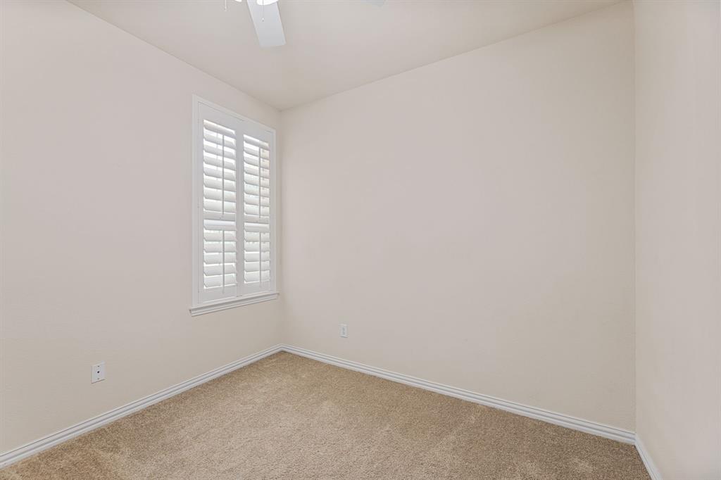 719 Scenic Ranch Circle Fairview, TX 75069 - Photo 29 of 36 an empty room with a window