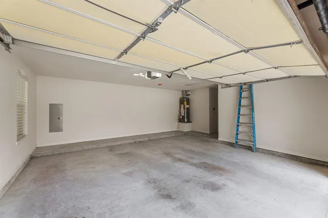 a view of a large building with a yard