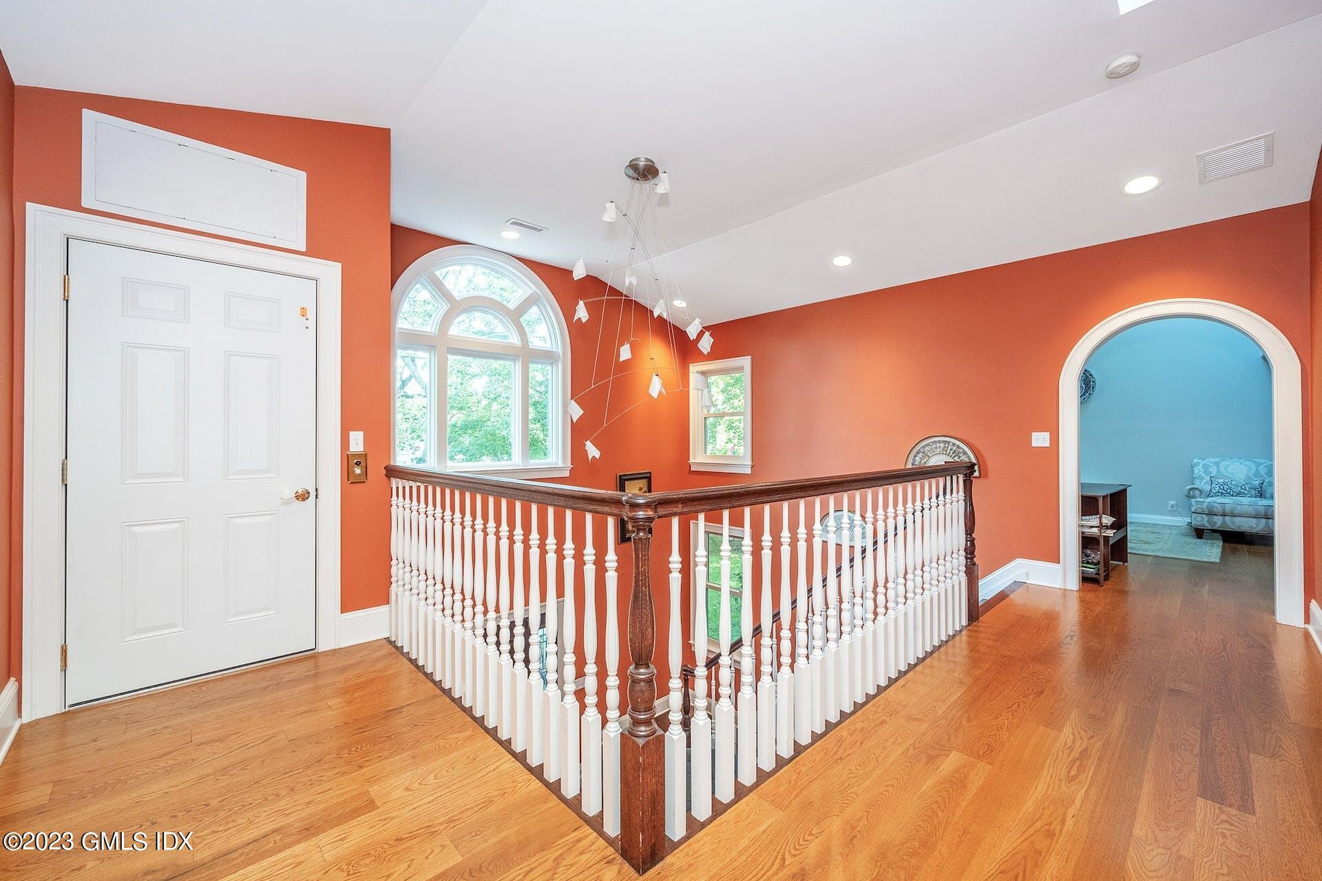 52 Hendrie Avenue Riverside, CT 06878 - Photo 13 of 30 a view of a living room and a large window