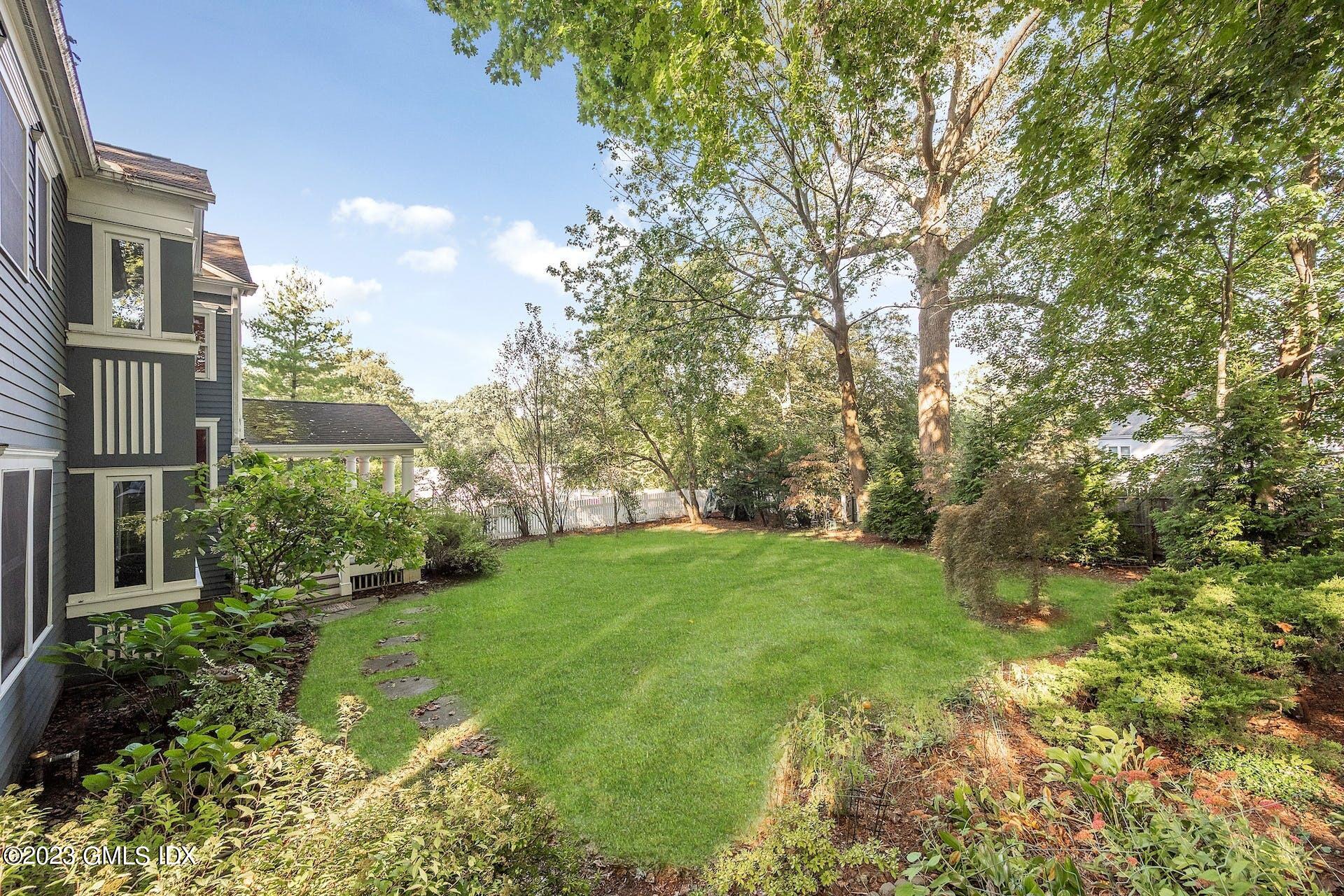 52 Hendrie Avenue Riverside, CT 06878 - Photo 29 of 30 a view of a garden with pathway