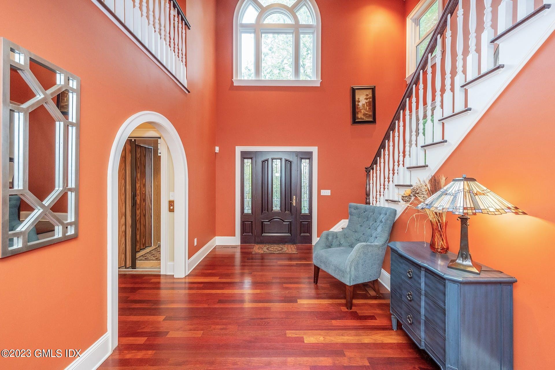 52 Hendrie Avenue Riverside, CT 06878 - Photo 4 of 30 a view of entryway and hall with wooden floor
