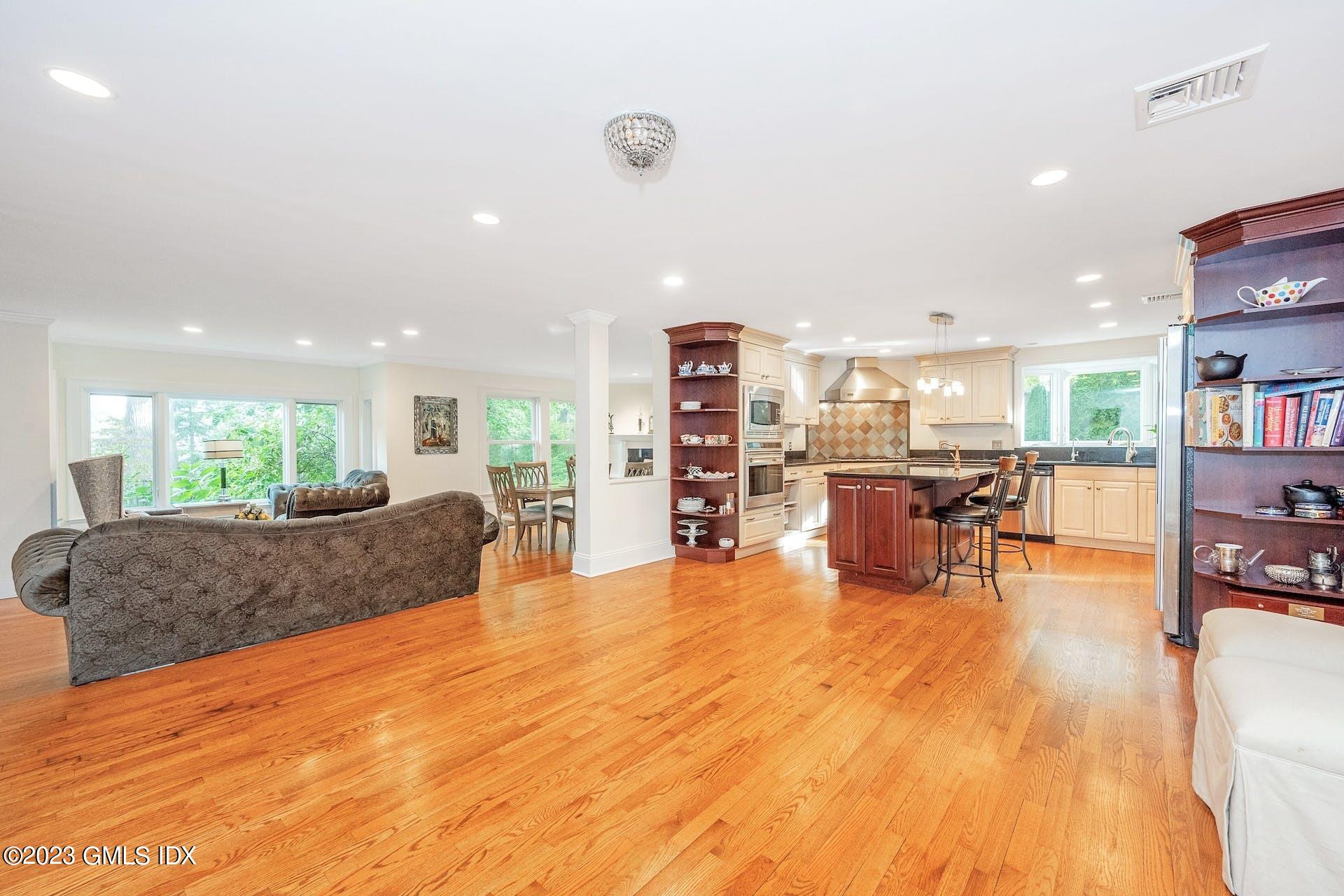 52 Hendrie Avenue Riverside, CT 06878 - Photo 9 of 30 a living room with furniture and a table
