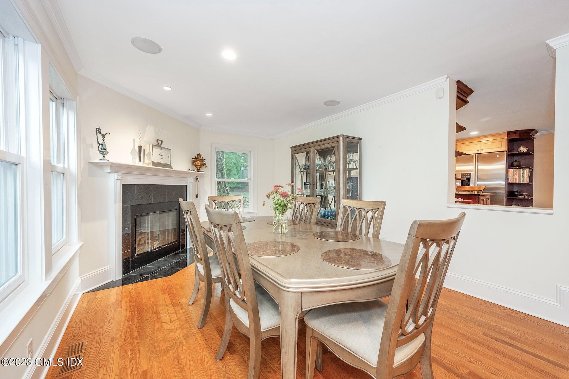 52 Hendrie Avenue Riverside, CT 06878 - Photo 10 of 30 a dining room with furniture window and wooden floor