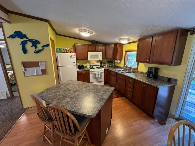 $194,900 | 7658 North Johnson Road, Irons, MI 49644