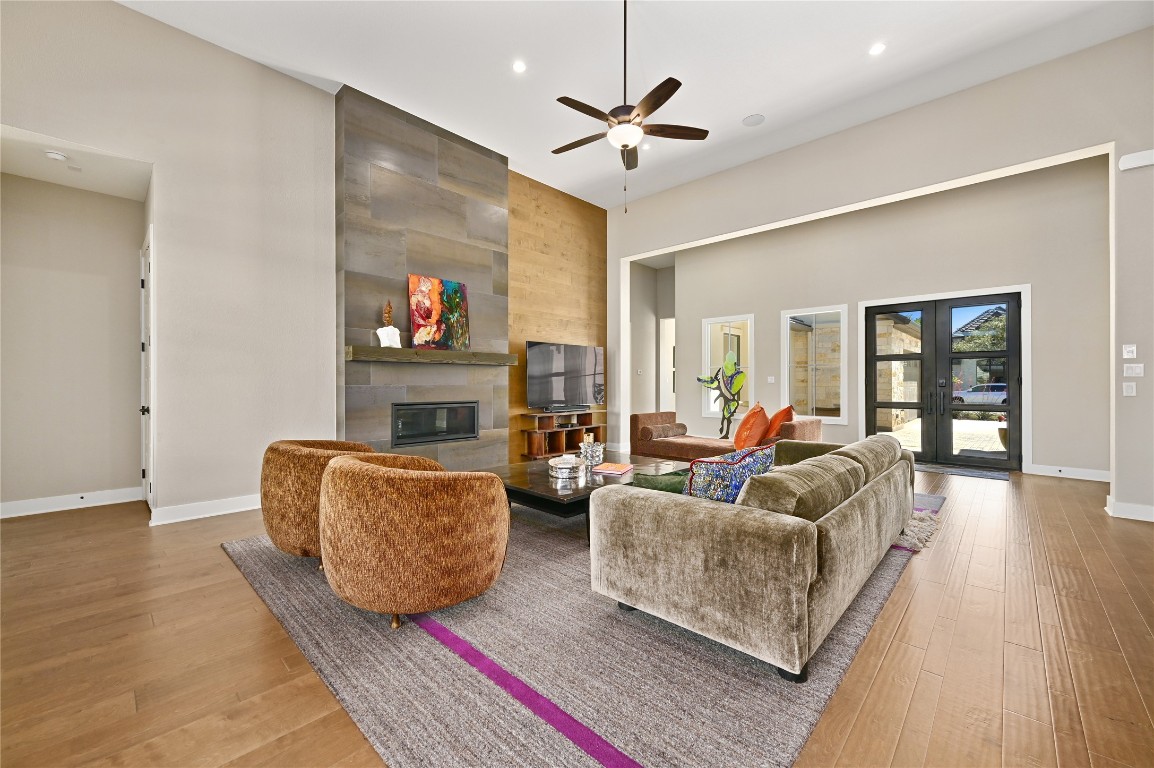 607 Flint Ridge Trail Georgetown, TX 78628 - Photo 4 of 35 Living room with a tiled fireplace
