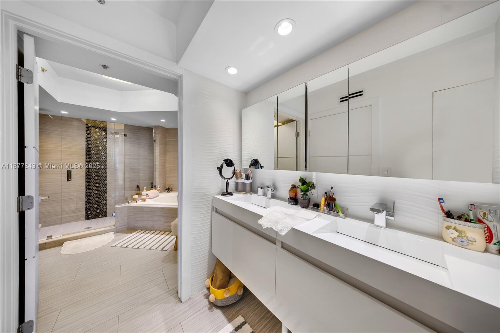 6301 Collins Avenue, Unit 2107 Miami Beach, FL 33141 - Photo 18 of 42 a view of bathroom with dual sinks