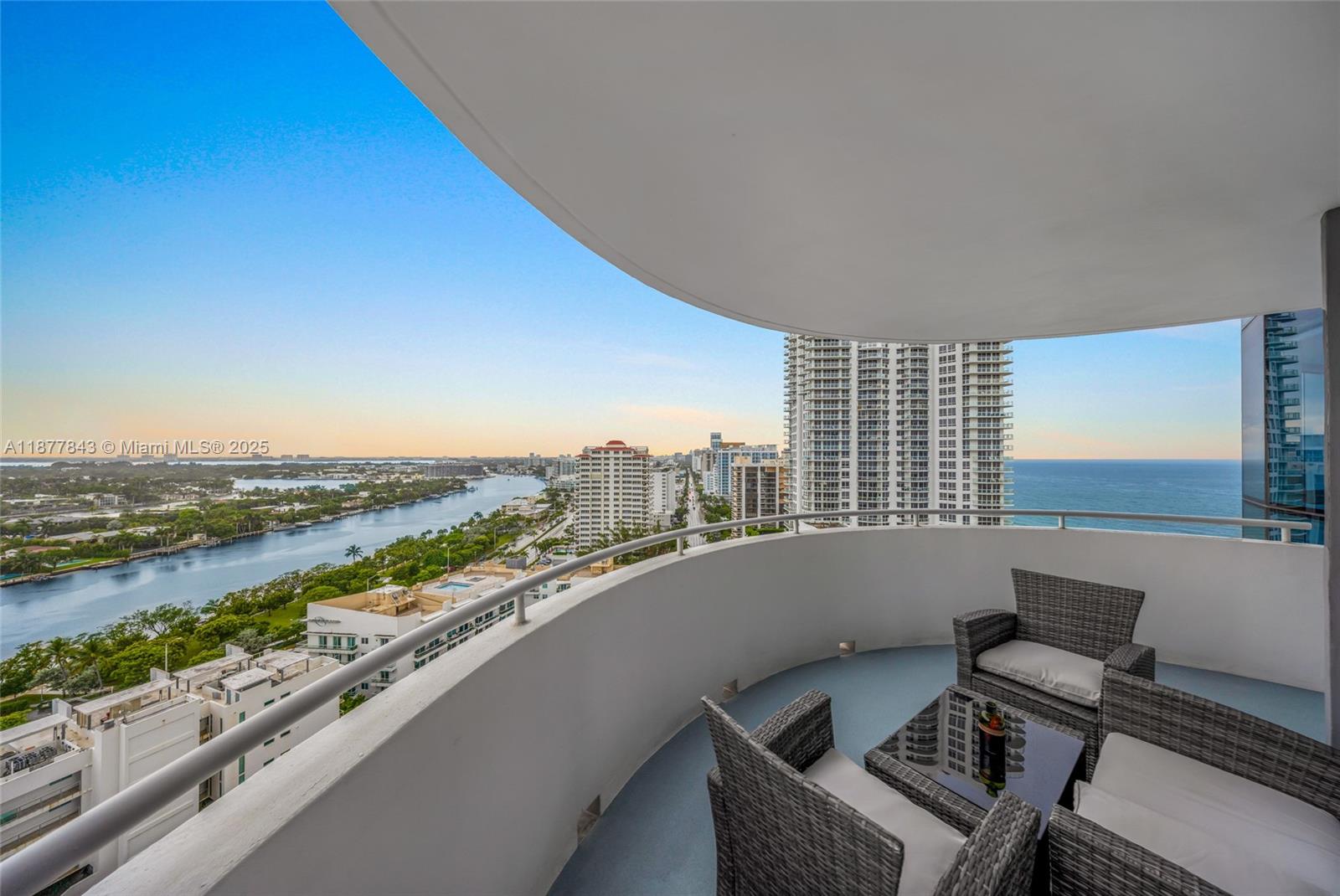 6301 Collins Avenue, Unit 2107 Miami Beach, FL 33141 - Photo 25 of 42 a view of a terrace with chairs